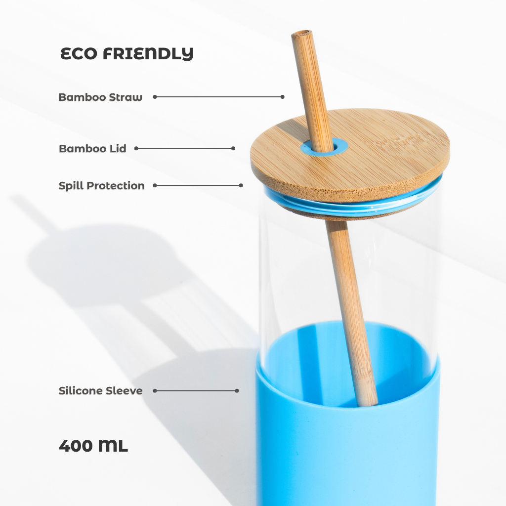 Sleek eco-friendly glass sipper with a bamboo lid and straw, featuring a minimalist design and a non-toxic, BPA-free build. Perfect for coffee and healthy drinks.