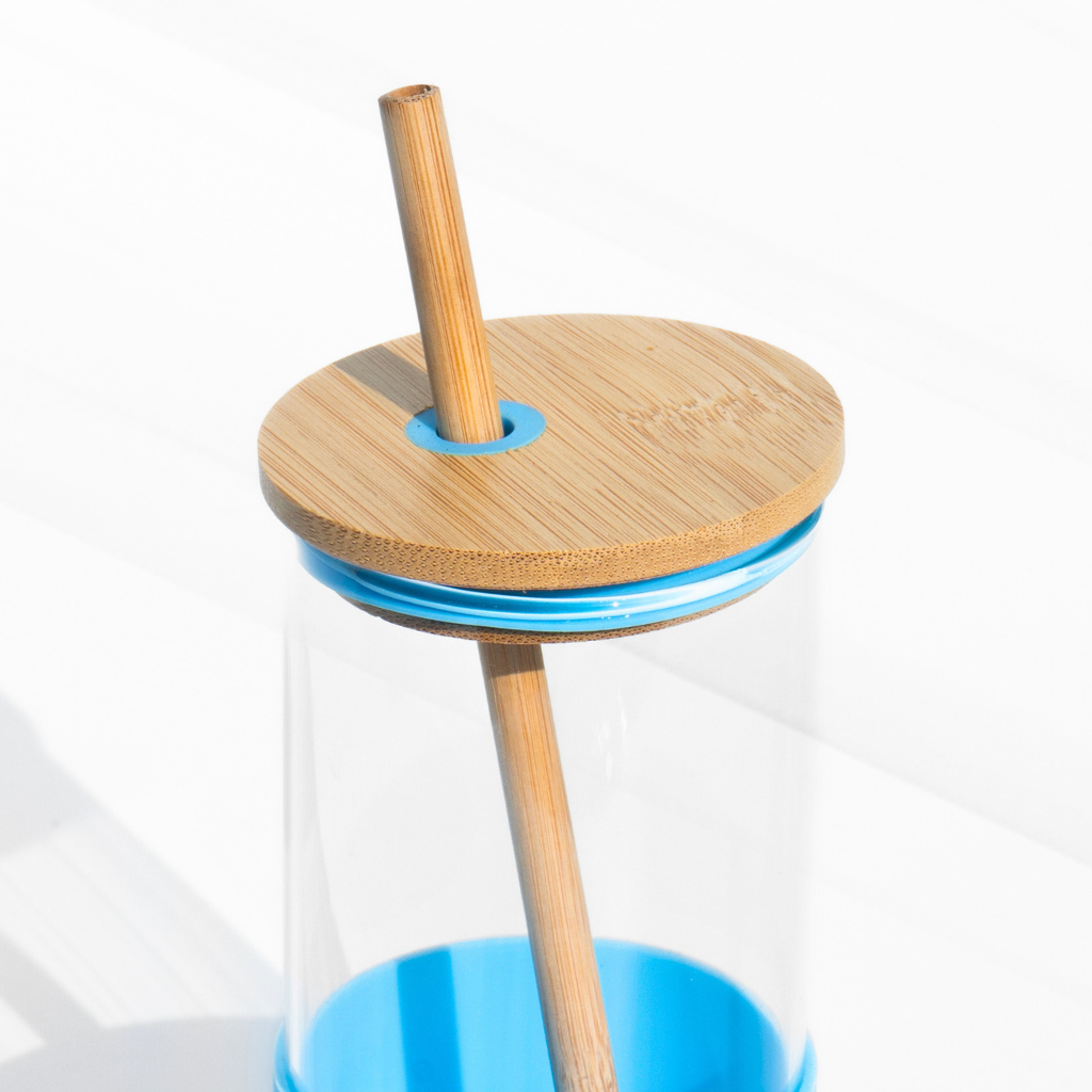 Sleek eco-friendly glass sipper with a bamboo lid and straw, featuring a minimalist design and a non-toxic, BPA-free build. Perfect for coffee and healthy drinks.