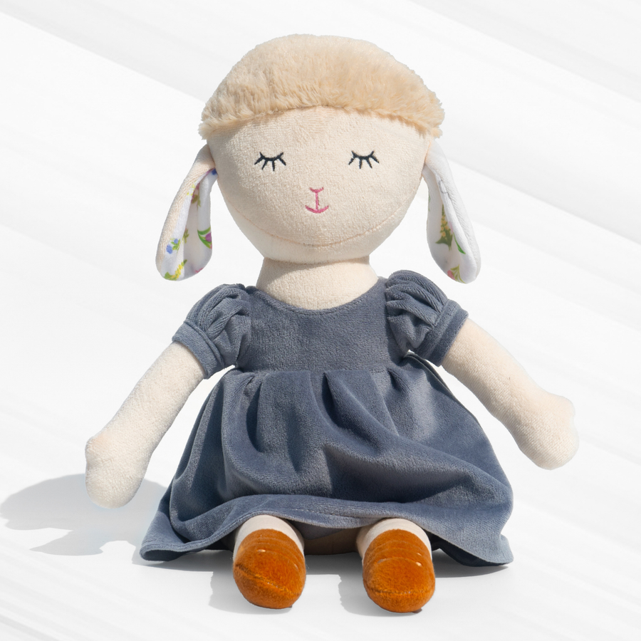 Gigi Sheep Doll in a stylish blue dress, made with plush material, super soft, huggable, and safe for kids – perfect for snuggles & decor.