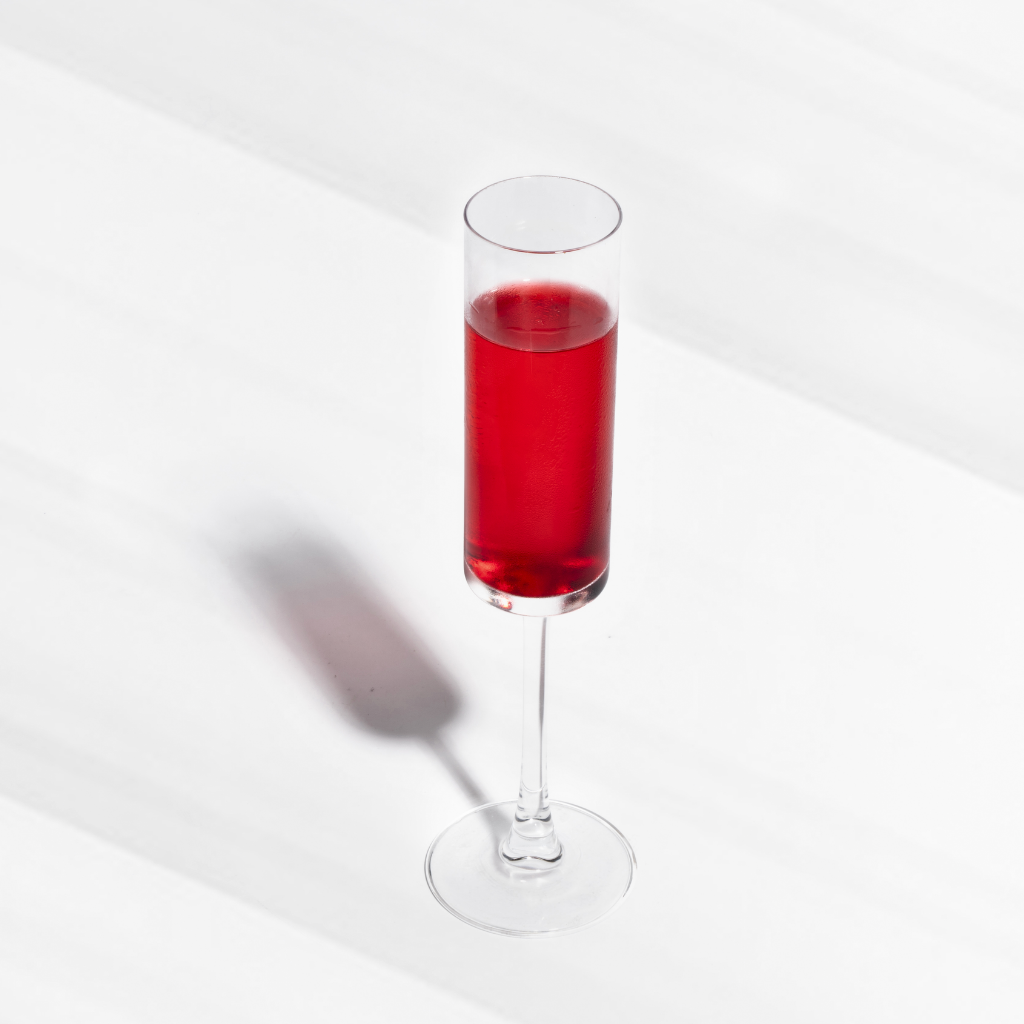 A crystal-clear champagne flute with a long stem, perfect for enjoying your favorite bubbly beverage.