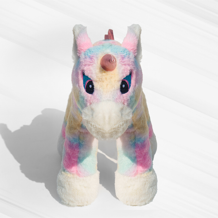 Standing unicorn plush toy in pastel rainbow colors, made with super soft plush material, ISI-certified, kid-safe, stress-relieving & huggable, perfect for all ages.