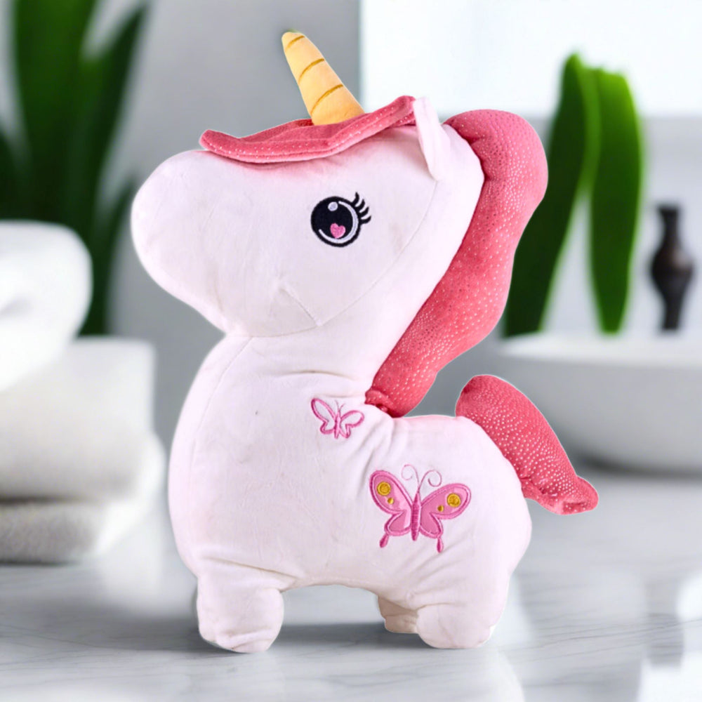 White plush toy unicorn with a pink mane and tail, and a gold horn. Made from 100% polyester fabric.